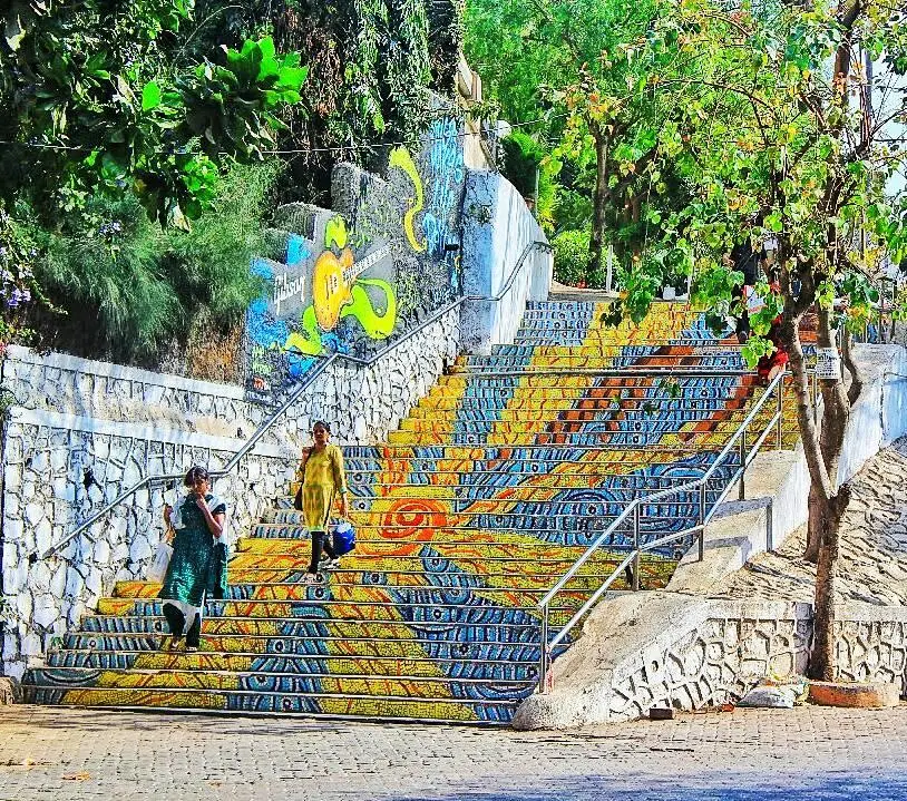 Mumbai Custom Tours group exploring Bandra street art with IanWalksMumbai
